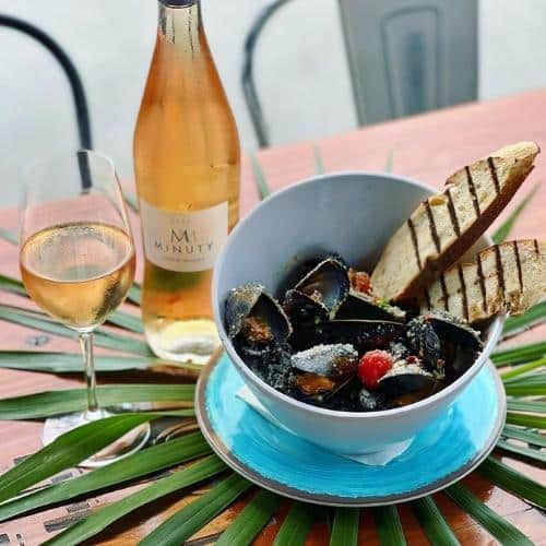 mussels and a glass of rose at hook'd in st thomas usvi